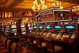 JILI live dealer studio with croupier at blackjack table